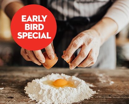 Early bird special promotion showing fresh pasta dough preparation with egg and flour on a rustic kitchen counter.